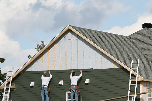 Professional Emergency Siding Repair technician working in Boston, MA